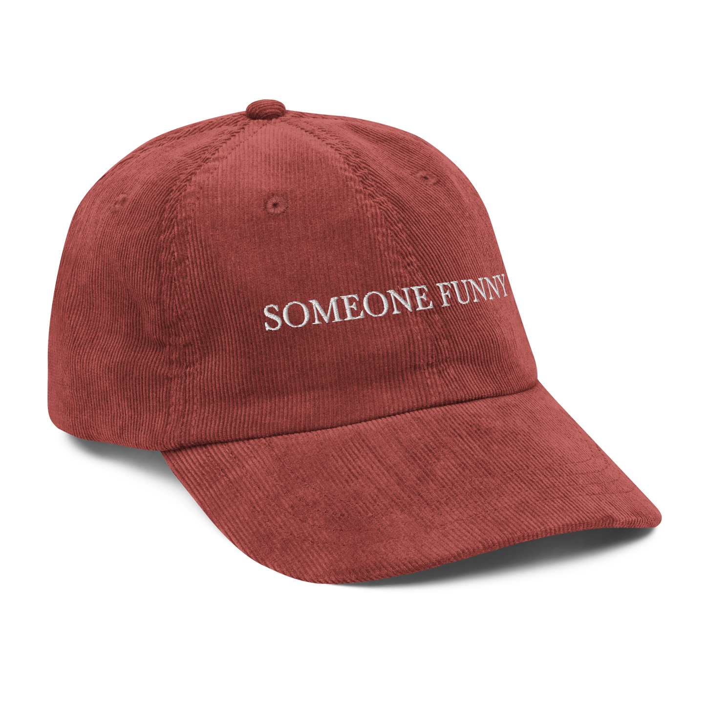 Red corduroy hat with 'SOMEONE FUNNY' text on a white background