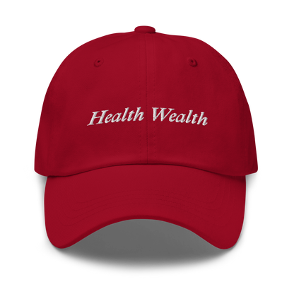 Red cap with 'Health Wealth' text on a white background